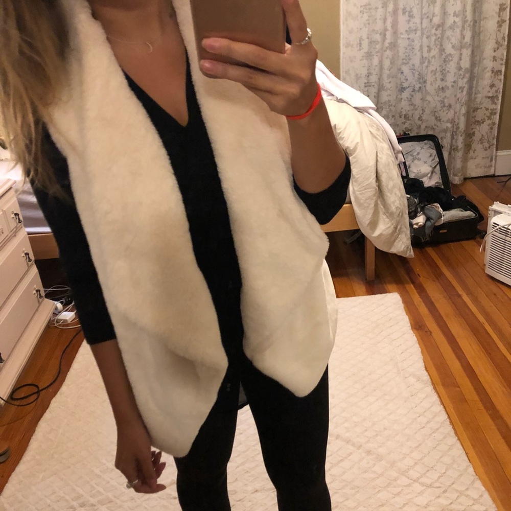 White furry vest from a small Boston boutique